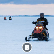 B) Snowmobiling